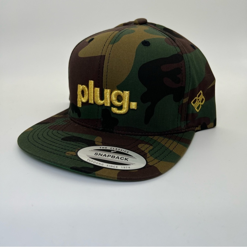 Plug Camouflage with Gold Metallic Lettering SnapBack Yupoong Hat New